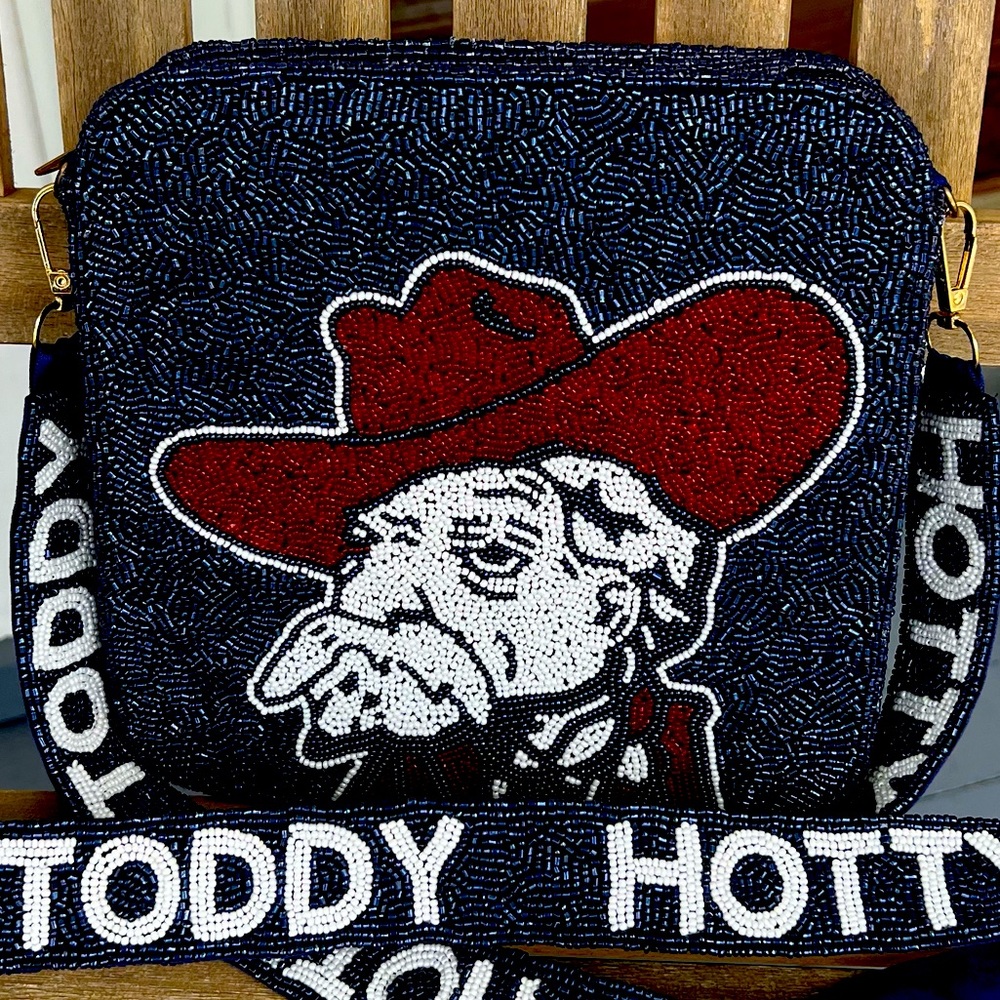 Ole Miss beaded bag. Never used but took tags off. Hotty Toddy beaded strap.